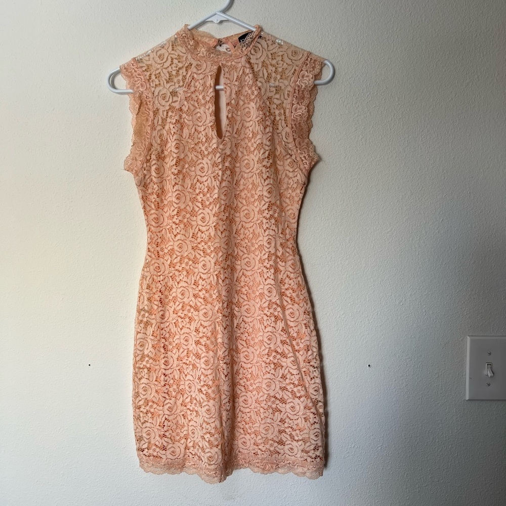 Lace Dress by Bebe in Peach